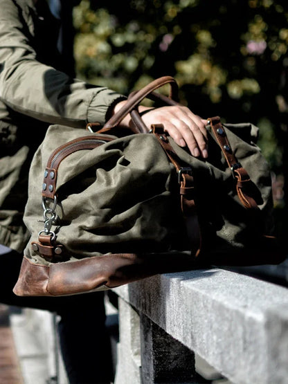 Canvas duffel bag carried