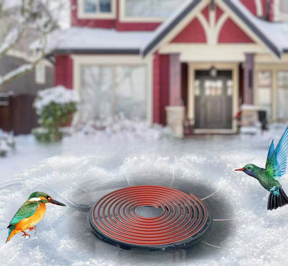 Birdbath de-icer keeping water open in winter
