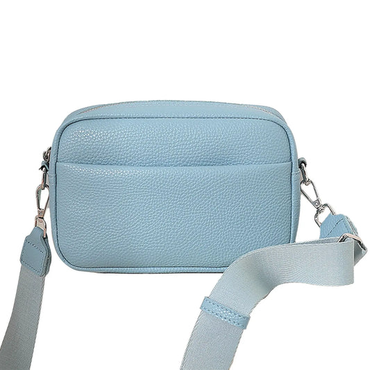 Genesis womens faux leather crossbody bag with wide strap